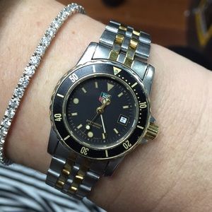 Tag Heuer black and gold ladies professional watch